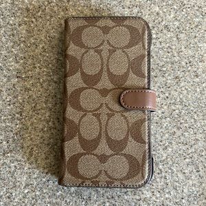 Beige and tan coach iphone wallet case